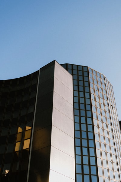 gray concrete building under blue sky during daytime